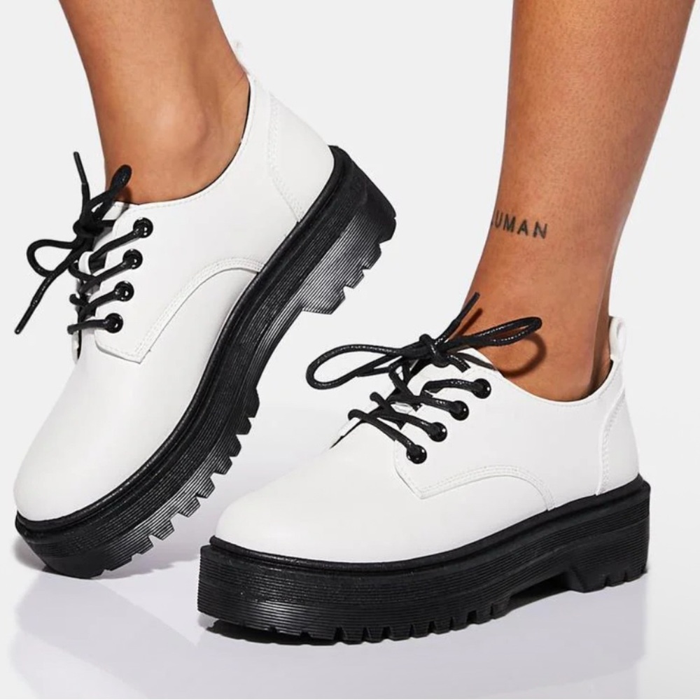 Steve Madden White and Black Lace-Up Platform Lug Sole Boots